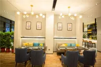 Echarm Hotel (Xiantao Wushang Sports Center) - فطور