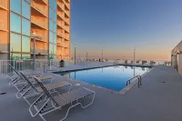 Salty Sands-Cozy 2-bedroom condo with WiFi, fitness room, directly on the beach! - 4つ星