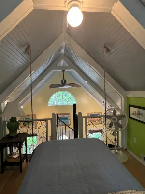 The Blue Cottage located in the woods on Lookout Mountain in Rising Fawn GA