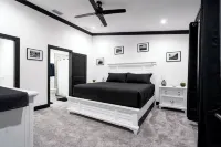 Lakefront Retreat w/Hot Tub, Arcade & Sunset Views - 4-Star