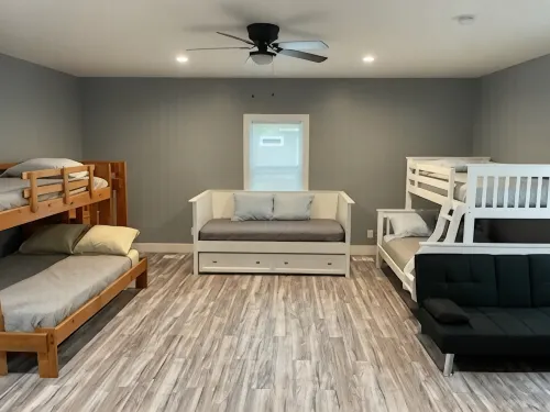 Torch Lake 4 bedroom home w/ large yard & parking