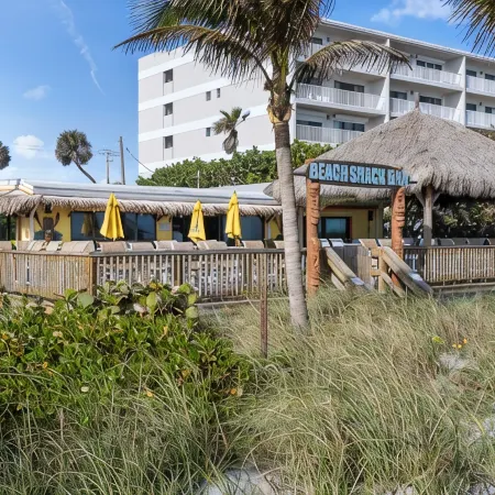 Wake to Waves, Watch Rockets Soar: Your Dreamy Oceanfront Condo Awaits
