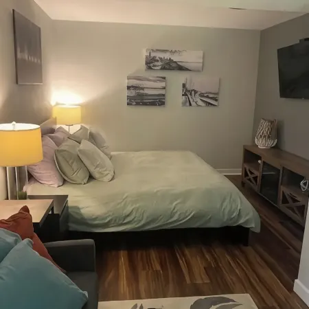 Modern studio with hot tub and patio access