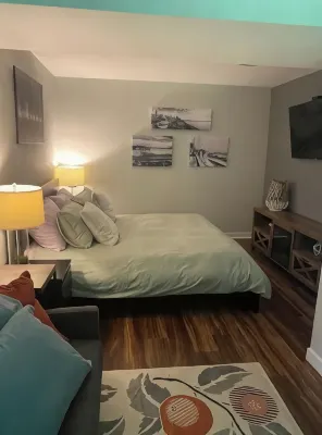 Modern studio with hot tub and patio access