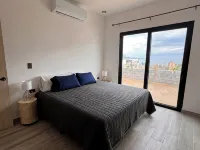 Modern, Clean & Airy Beach Retreat with Pool and Rooftop Ocean Views Hotels in El Sargento