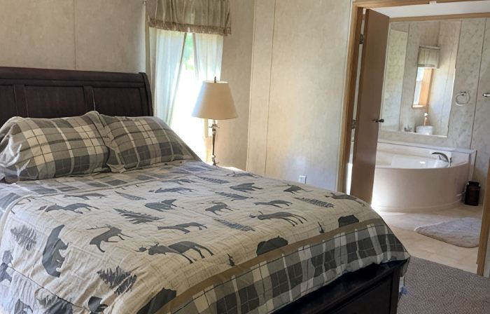 UPNORTH GETAWAY.  Spacious 4 bedroom,  3 bathroom.  On the ATV/Snowmobile Trails
