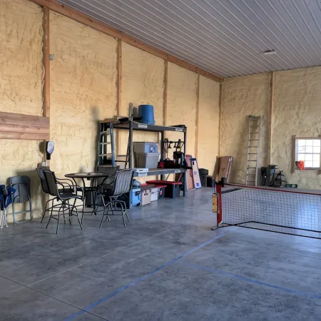 Barndominium in the country. Two acre fishing lake, large porch and Pickleball.