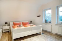 Dream vacation home NordseeStar with fireplace and lounge in Neßmersiel - 3-Star