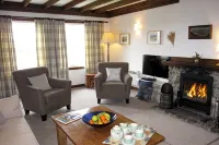 Lovely Waterfront Cottage With Stunning sea Views and log Fire - Homestays