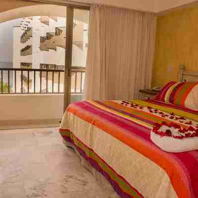 Beachfront 2 Bedroom Condo at Tesoro Hotel & Condo Resort Rooms