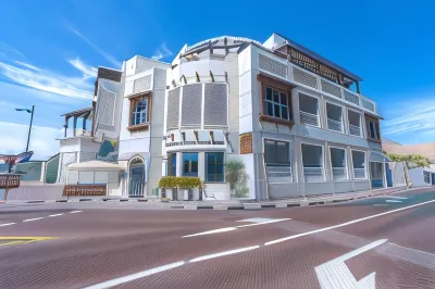 Beach Walk Boutique Hotel Отели рядом с достопримечательностью «Офис компании Nestlé в ОАЭ»