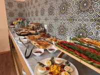 Sunrise Apartments - breakfast