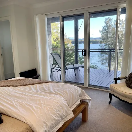 Absolute lake front - lie in bed & listen to the fish jump!