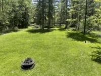 Whispering Pines By The Bay, quiet seclusion near water and town - 4-Star