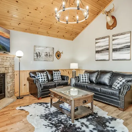 Only Minutes to Attractions with Indoor Sauna, Hot Tub, Games, and Fireplace!