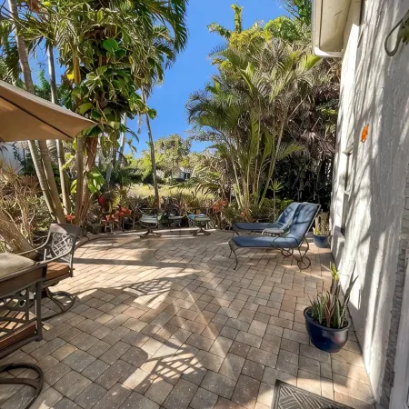 5-8 MINUTE WALK TO BEACHES, DINING & SHOPPING! RARE PRIVATE PATIO & LAKE VIEW!