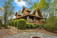 Cozy Fireplace and Scenic Porch Retreat - Charming Log Home