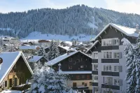 Au Coin du Feu Hotels near Téléphérique de Rochebrune