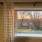 Cheerful two bedroom home in quiet neighborhood. Sun Porch ~ Patio ~  Large yard