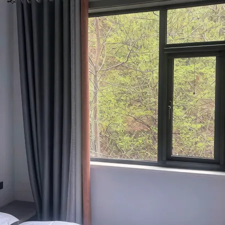 Yuchuan Yashiju Inn