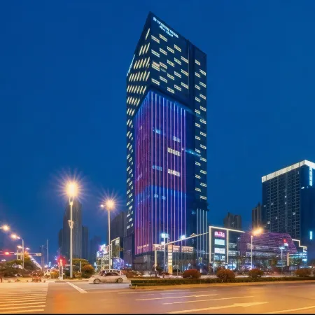 Wanjia Hotel (Fuyang Baolong City Plaza)