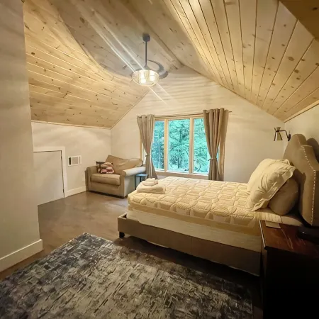 Breathtaking lake views, steps from beach, golf, and clubhouse. Renovated home!
