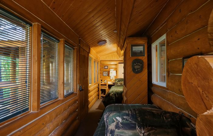 Unique Alaskan log home in trees & wild flowers on 14-acre private homestead.