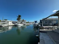 Canal-Front Coastal Escape with Private Dock & King Suite - Homestays