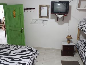"room in Guest Room - Posada Green Sea in the Harmony Hall Hill Area of San Luis"