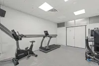 Serenity By The Sea: Modern Beachfront Condo with Stunning Views - Gym