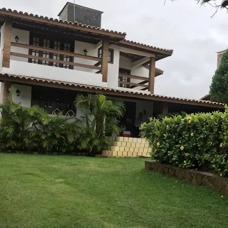 Cozy and Charming House with Pool and Gardens in a Beachfront Condominium!