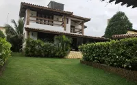 Cozy and Charming House with Pool and Gardens in a Beachfront Condominium!