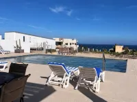 Modern, Clean & Airy Beach Retreat with Pool and Rooftop Ocean Views Hotels in El Sargento