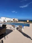 Modern, Clean & Airy Beach Retreat with Pool and Rooftop Ocean Views