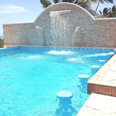 Villa Flamingo; Sleeps 8; Waterfall, Oceanfront Pool, Hot Tub