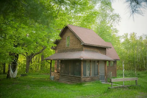 Spiral Staircase Leads To The Lofted Bedroom And Overlooks The Birch Woods. - Hytter