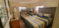 30 Seconds to Beach Path! Tiki Bar with Outdoor TV! Bikes, Kayaks, Sups & More! - balcony