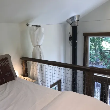 On a 40 acre estate, outdoor soaking tub,  fire pit, hammocks, pet friendly!