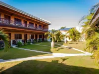 Coucou Bar Hotel and Restaurant Hoteles cerca de Paradise Beach