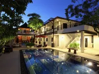 Surintra Boutique Resort Hôtels à proximité de : Plage de Laem Sing