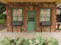 Stay in a Restored 1940s Texaco Station with Spa Bath & Oak Courtyard Hotels in Brown County