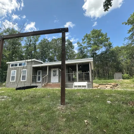 Branson Tiny Home on 52 Acres w/ Private Stocked Pond 1/4 mile hike from home!
