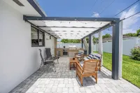 Luxe Coastal Retreat - 4BR w/ Pool, Hot Tub, Arcade & Work Space - 3 mi to beach