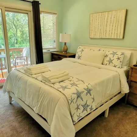 Updated beach house with private pool, hot tub, and community fitness center!