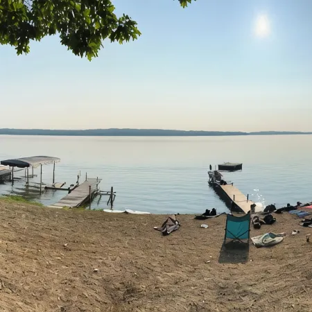 Rustic View Cabin sits on a 2.5 acres on beautiful Hubbard Lake.