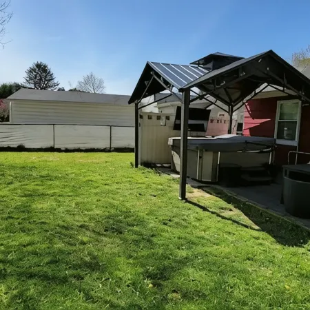 The White House w/ Hot Tub Portage Lakes Fenced Yard Pet-Friendly!