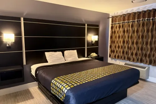 Coratel Inn & Suites by Jasper Hastings - parking