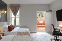Spacious Modern 4Br Urban Retreat with Game Room, Yard, Near Path Train& NYC Bus - 4-Star