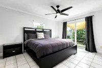 Pool Home W Beautiful Tiki Hut - 3 Bed 3 Bath. 1 Mile from Beach! - 4-Star