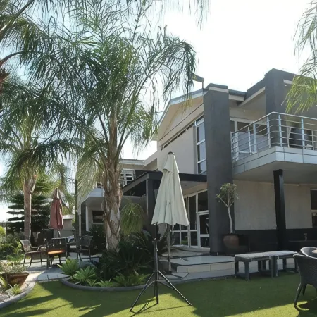 Cycad Palm Boutique Guest House